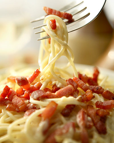 Bacon strips and chicken pieces