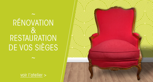 Artisan tapissier travaillant sur un fauteuil